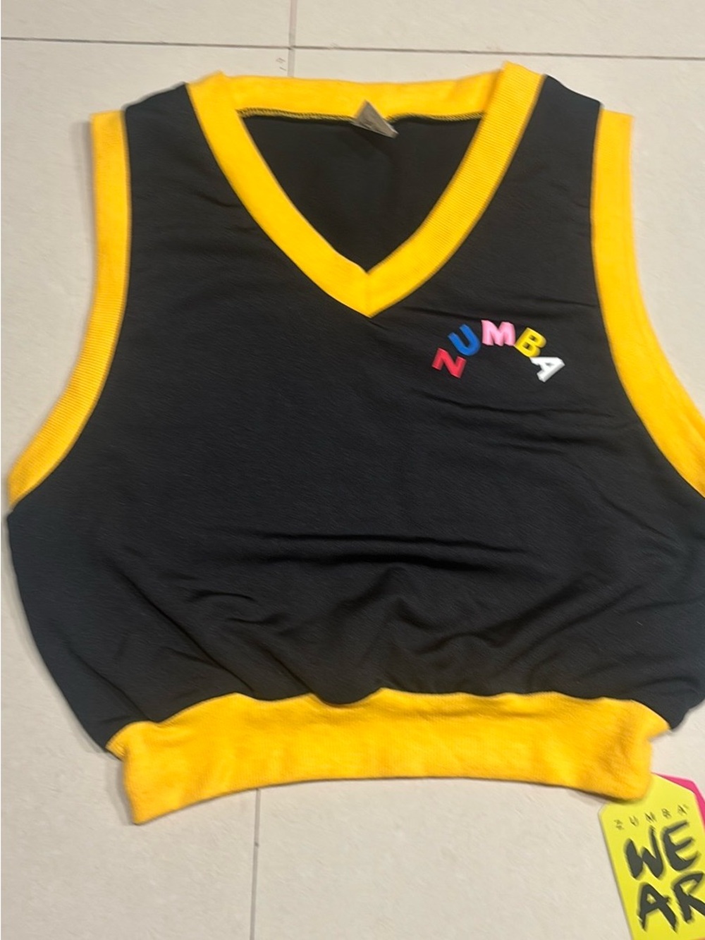 Zumba Fitness Black Tank Top with Yellow Trim and Multicolor Logo